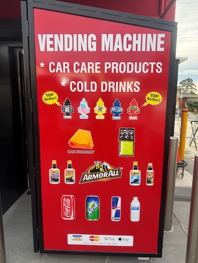 On-site vending machine with car care products and cold drinks